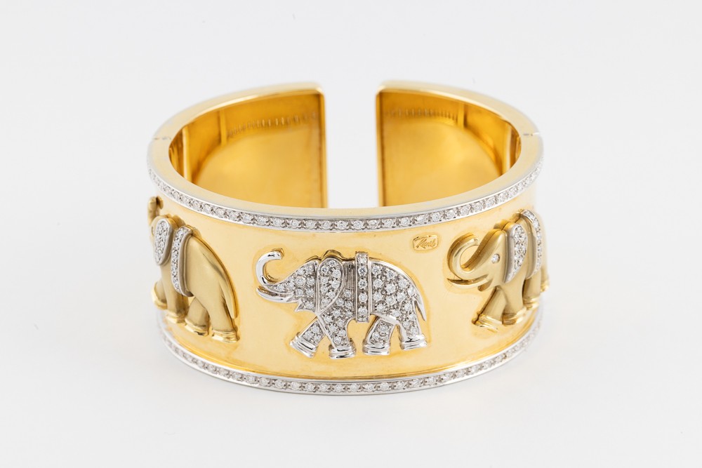 Bracelet manchette rigide or jaune et diamant