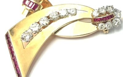 LACKRITZ Paul N. broche ruban en or jaune, rubis et diamants